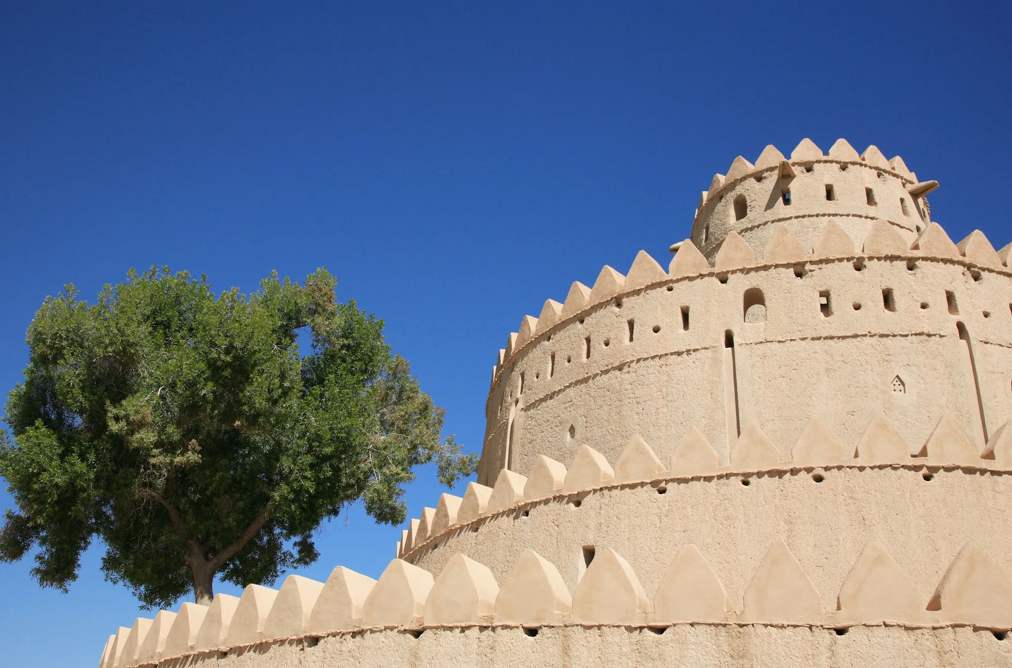 Fort tower in Al Ain under a clear sky